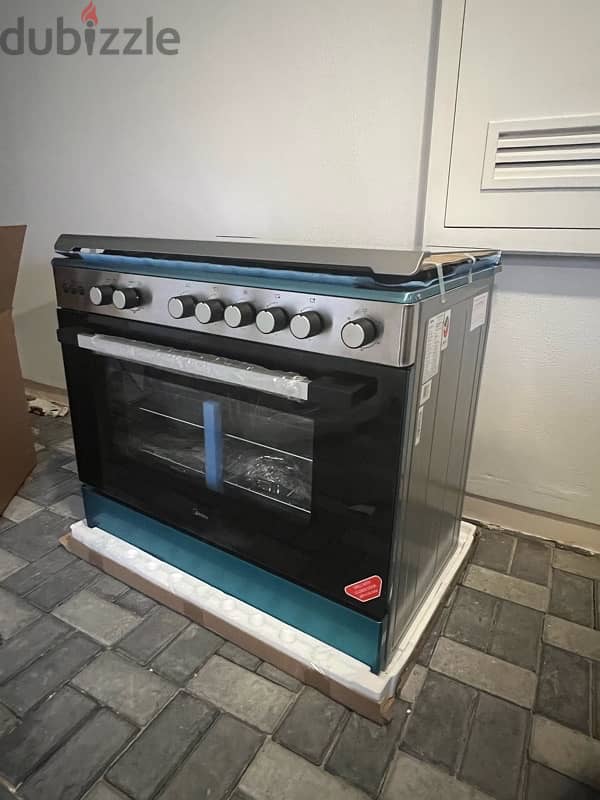 Midea Freestanding Cooker with 5 Gas Burner 1