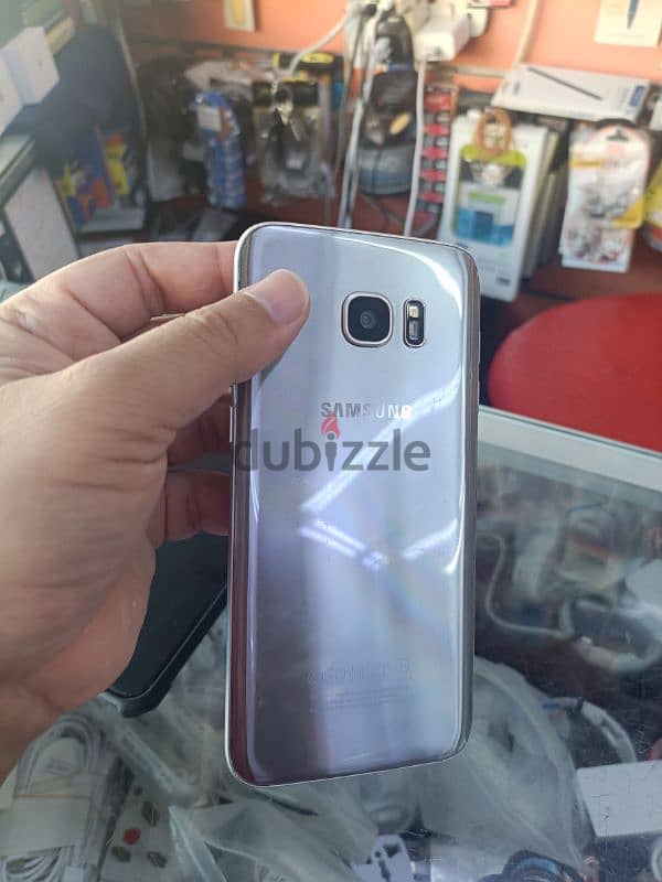 Samsung S7 EDGE. silver colour. good condition. 5