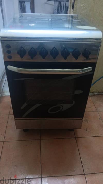 Four burner cooking range (oven) with cylinder