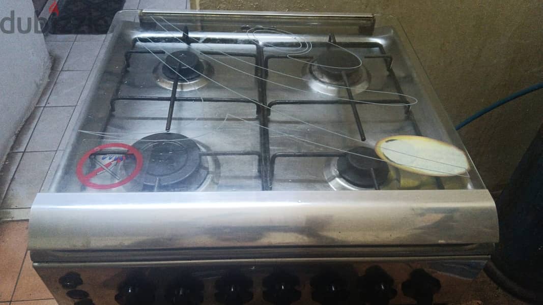 Four burner cooking range (oven) with cylinder 6