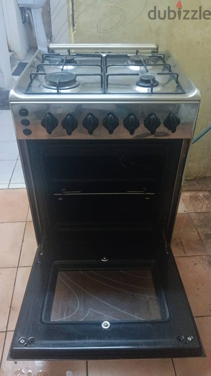 Four burner cooking range (oven) with cylinder 8