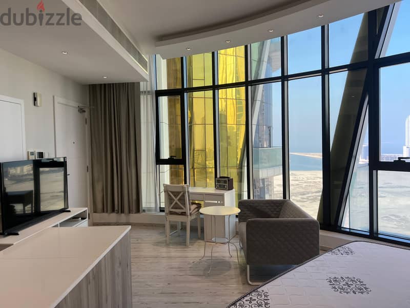 Sea view studio with balcony in seef district 0