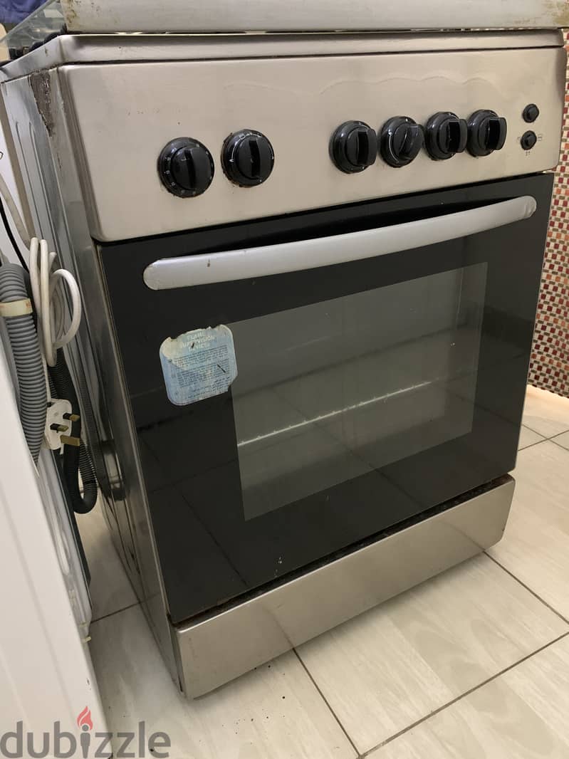 Fridge and gas stove available with good condition 2