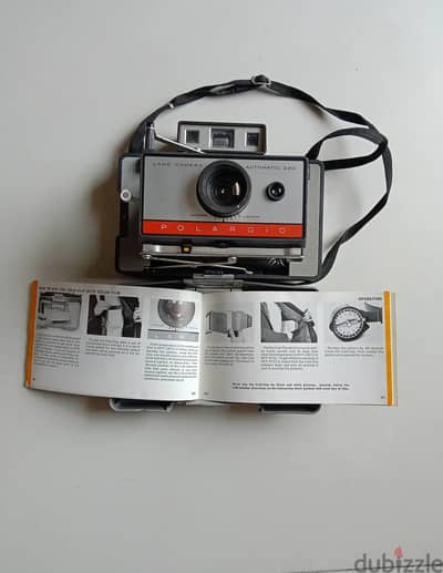 Polaroid 220 with manual book