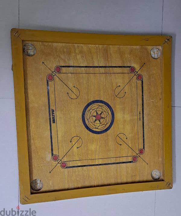 carrom board with coins 1