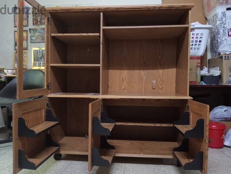 Wooden TV cabinet moveable(with wheels) with lots of storage space 1