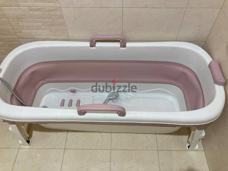 Portable bath tub for sale, for pick-up in Salmaniya area. 2