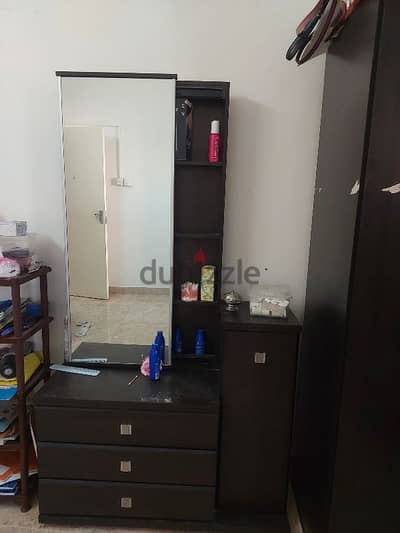 Dressing table with slide mirror