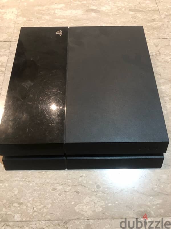 PlayStation 4 with 2 games for sale 1