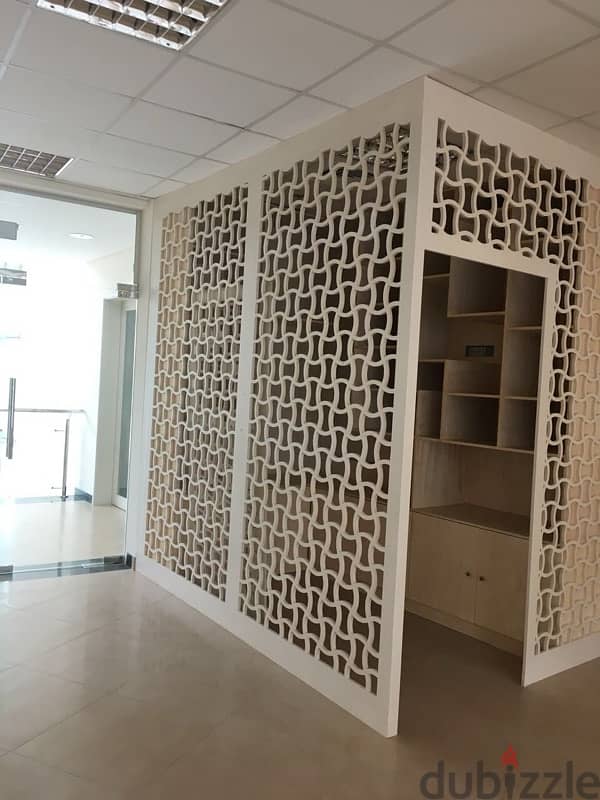 beige wood shelves and cupboards for shop 6