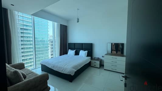 1 bedroom apartment on higher floor with partial sea view