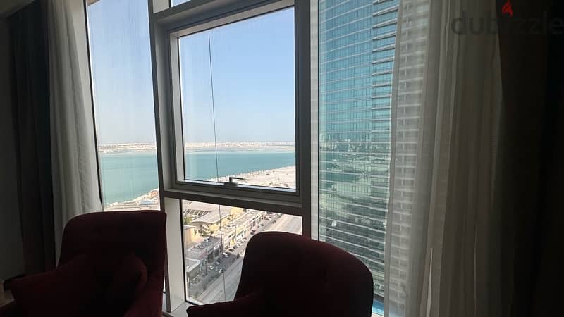 1 bedroom apartment on higher floor with partial sea view 1