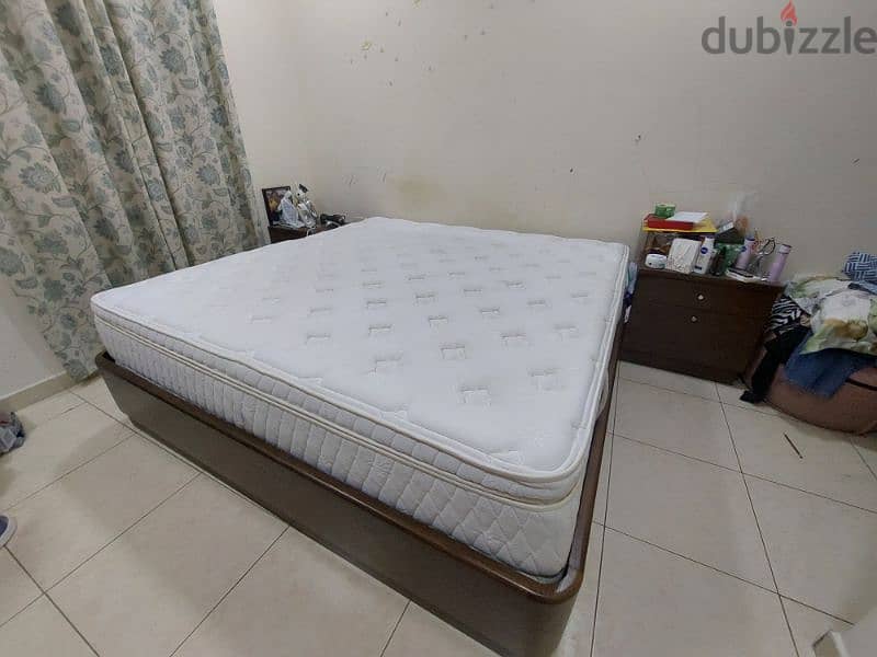 King size bed and mattress with two side tables for sale 0