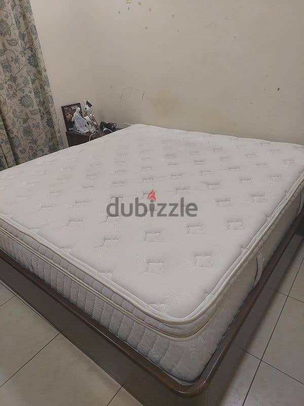 King size bed and mattress with two side tables for sale 1