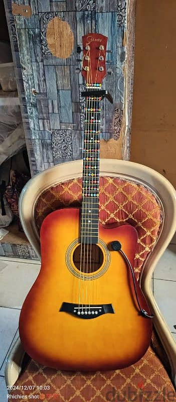 used like new acoustic guitar 1