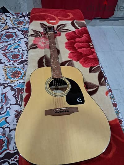 Accoustic guitar with accessories (Urgent sale - New condition)