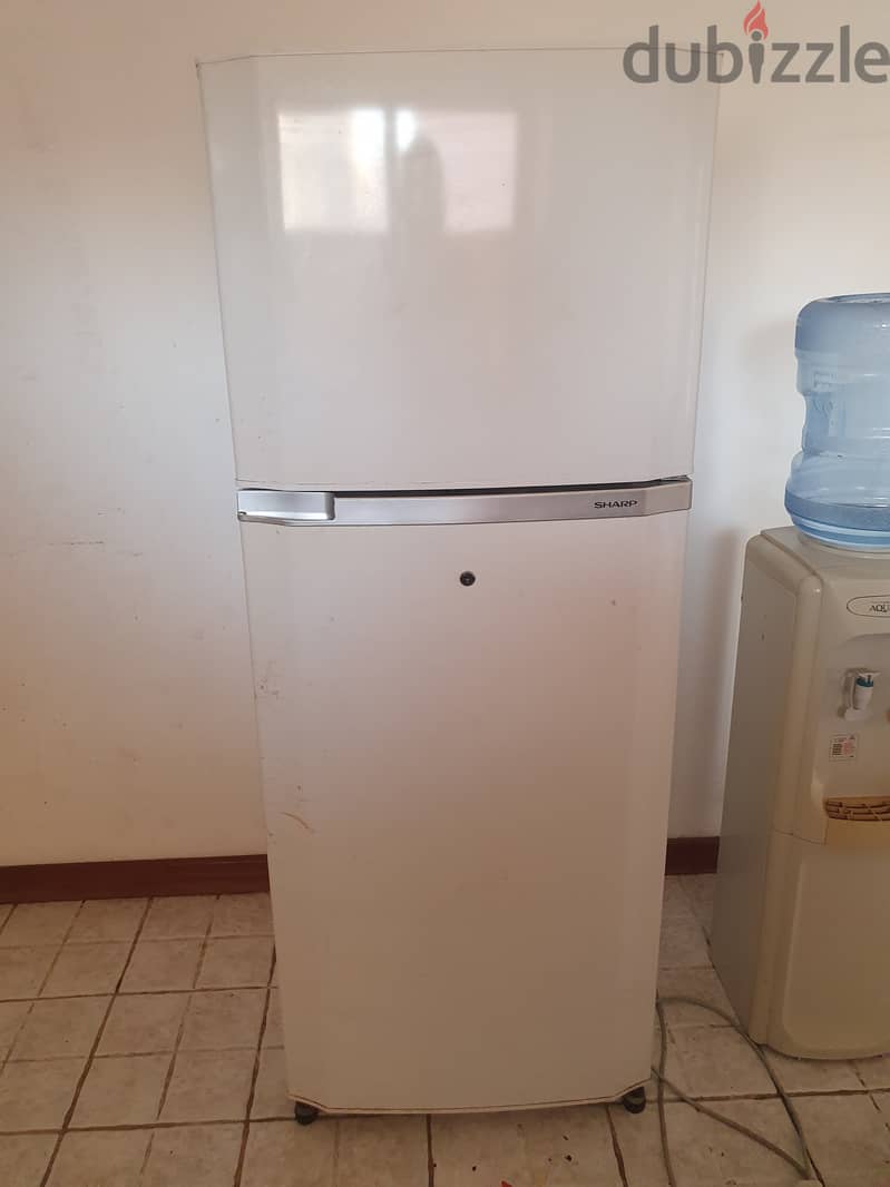 sharp  fridge condition like new 0