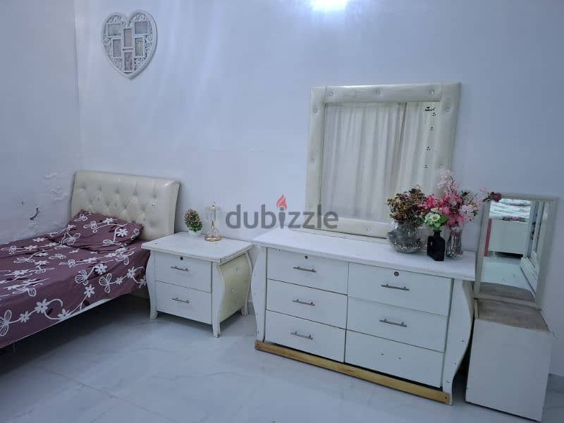 furniture set: 2 beds, dressing table, 1 side table and a closet 0