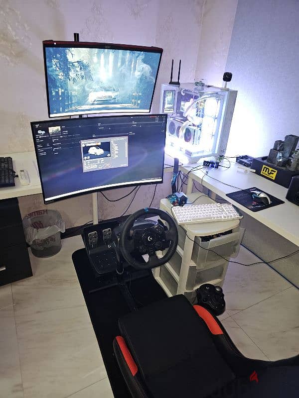 Gaming pc + Racing wheel + headphones +keyboard +mouse + monitors 1