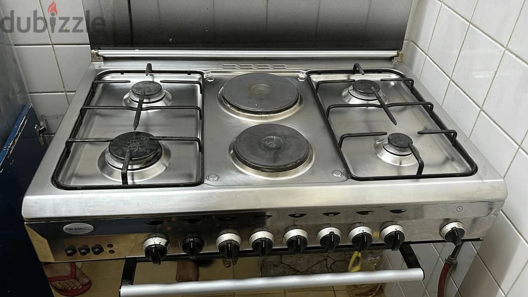 6 Burners (4 gas Burner and 2 electrical burner) and oven/Grill 1