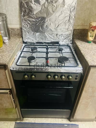 four burner cooking range with oven for sale