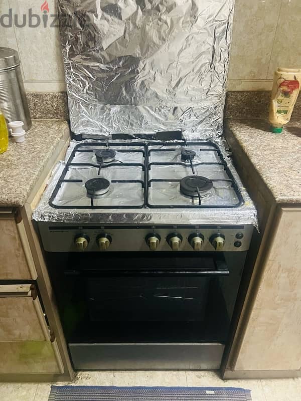 four burner cooking range with oven for sale 1