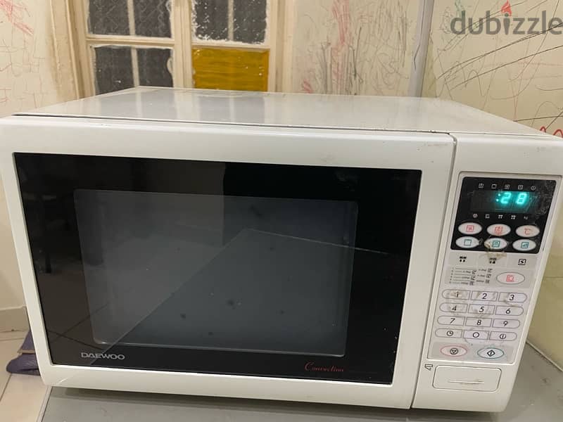 Dawood grill and microwave oven for sale 0