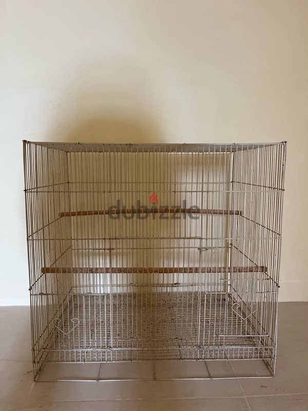 bird cage without a house inside of it and I will clean it as well 1