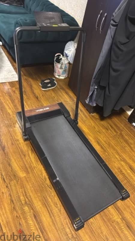 treadmill , rowing machine , abs and back machine 4