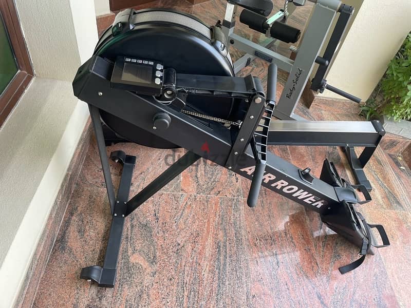 treadmill , rowing machine , abs and back machine 7