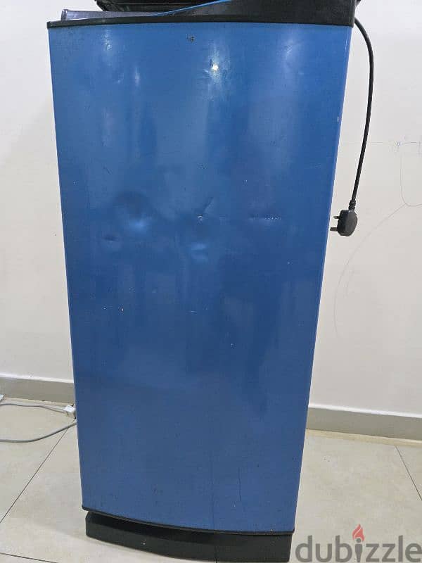 FRIDGE barely used blue colour medium size works well 0