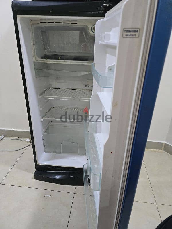 FRIDGE barely used blue colour medium size works well 1