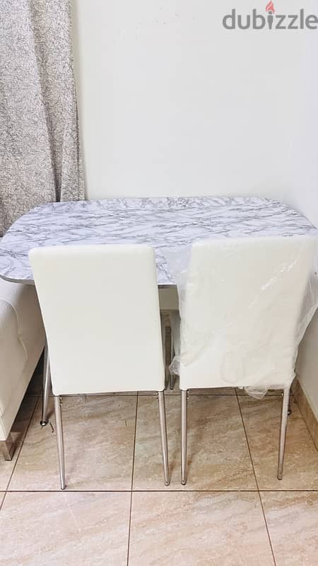 Dining table new with 4 chairs 1