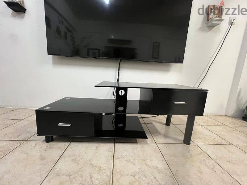 Urgent sale 60-inch Android TV and stand 2