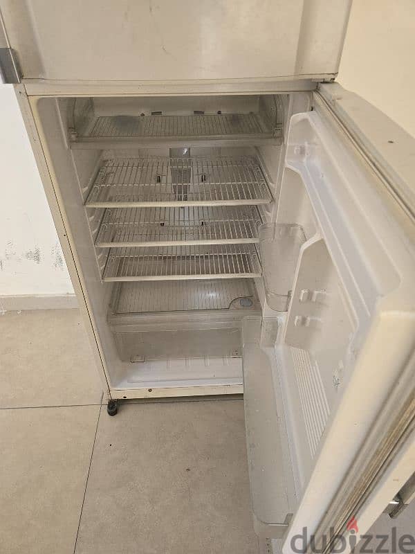 fridge rarely used white colour large size works well 1