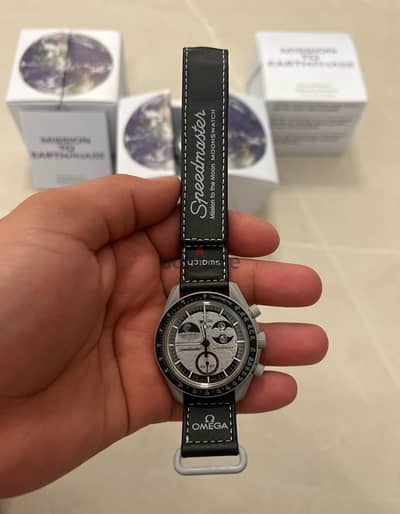 swatch X omega earthphse new/سواتش اوميجا احدث اصدار جديدة ماستر