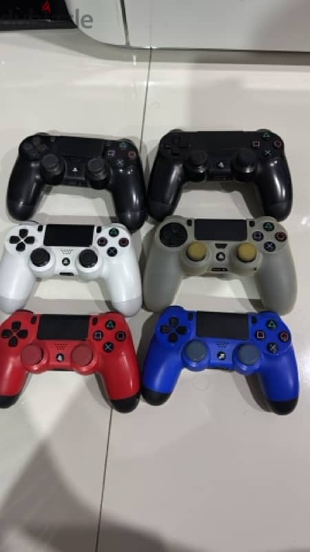 For sale PS4 slime & PS4 Pro with 6 controllers & 9 games 1