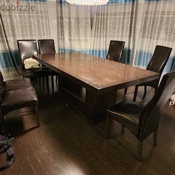 Solid table and 7 chairs - free 0