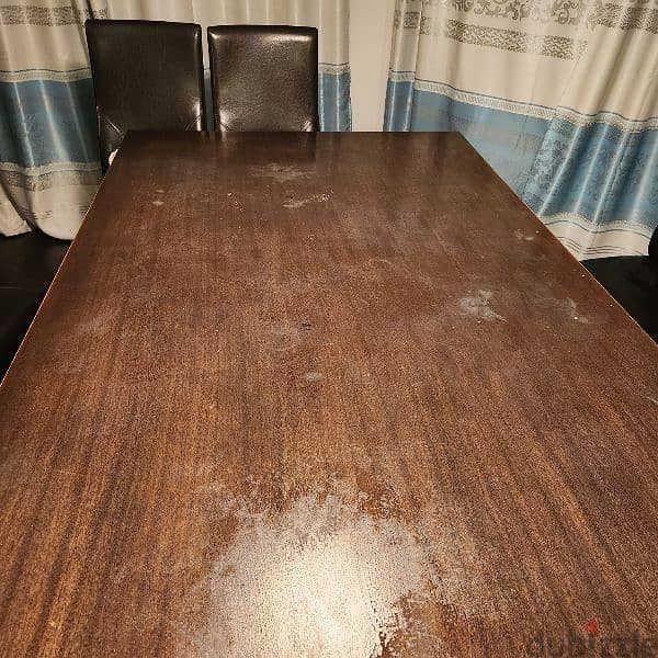 Solid table and 7 chairs - free 2