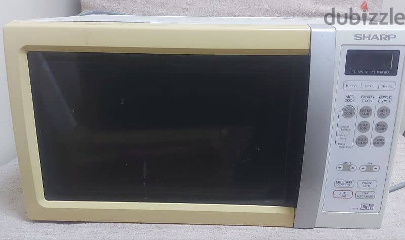 ac 2 Ton and microwave oven in excellent condition 1