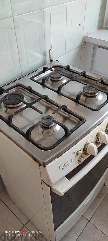 MIDEA Cooker gas with grill 9