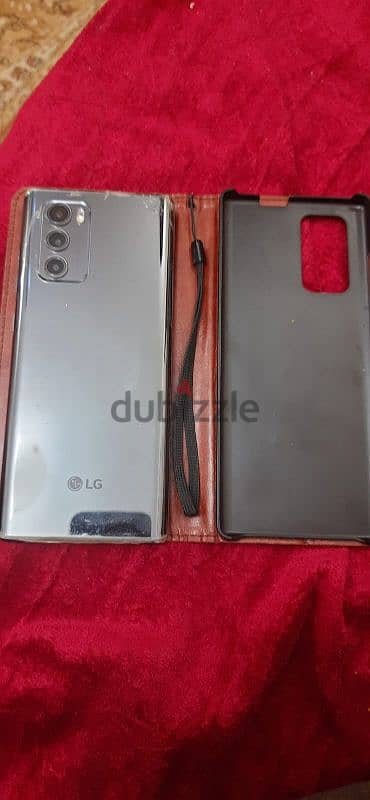 LG Wing 5g 8gb ram 256 storage with fixed product and with cover book 1