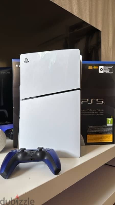 PlayStation 5 slim with cosmic blue controller 0