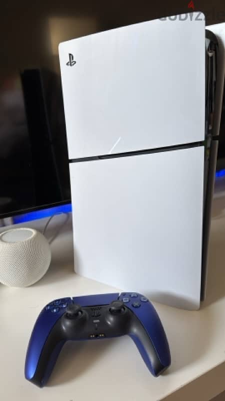 PlayStation 5 slim with cosmic blue controller 1