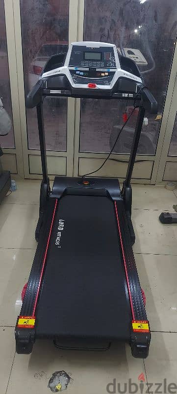 treadmill like new 120kg only 75bd 1