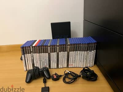 hurry PS2 with 35 games 2 controllers and all cables included