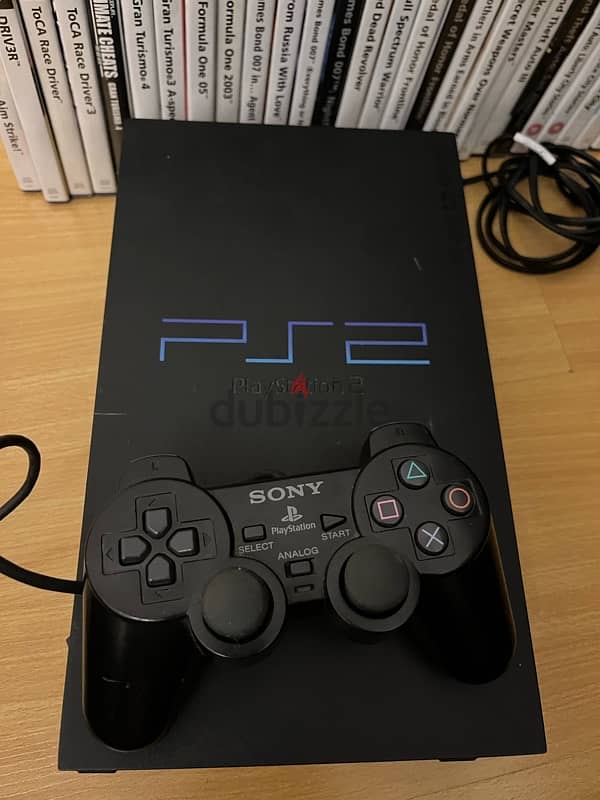 PS2 with 35 games 2 controllers and all cables included 5