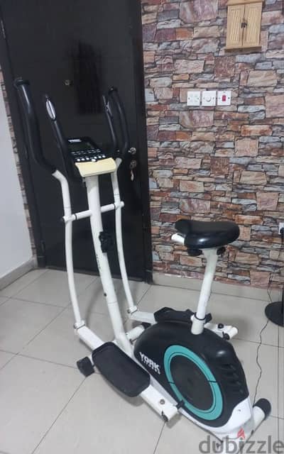 Electric heavy duty seated cross trainer