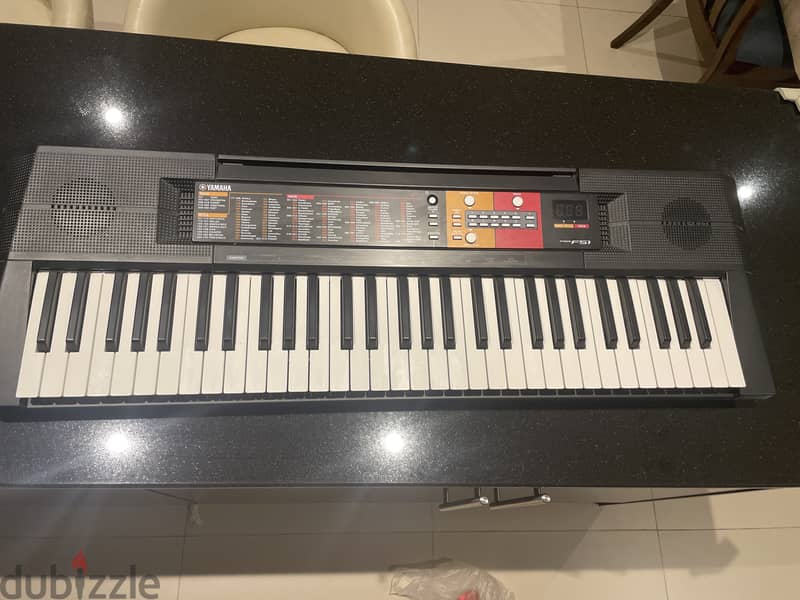 Yamaha psr F51 with adapter 1