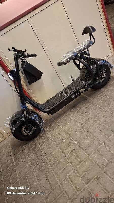 Electric scooter new arrival just WhatsApp 3